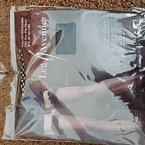 Fishnet thigh highs with lace ruffle